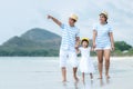 Happy family summer seaÃÂ  beach vacation. Asia youngÃÂ people lifestyle travel enjoy fun and relax in holiday. Royalty Free Stock Photo